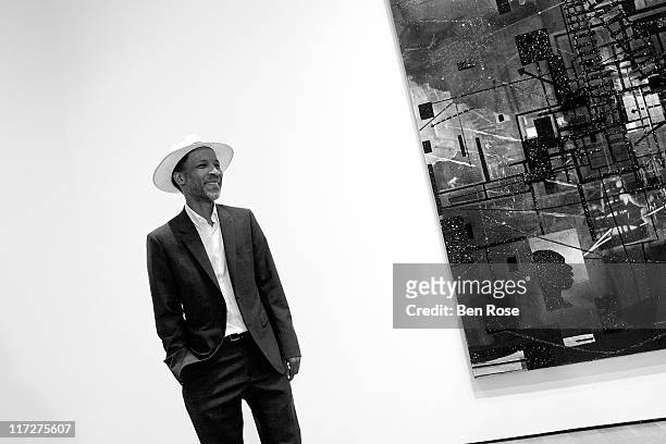 Artist Radcliffe Bailey discusses his work while leading guests on a private tour of the exhibit "Radcliffe Bailey : Memory as Medicine" at High...