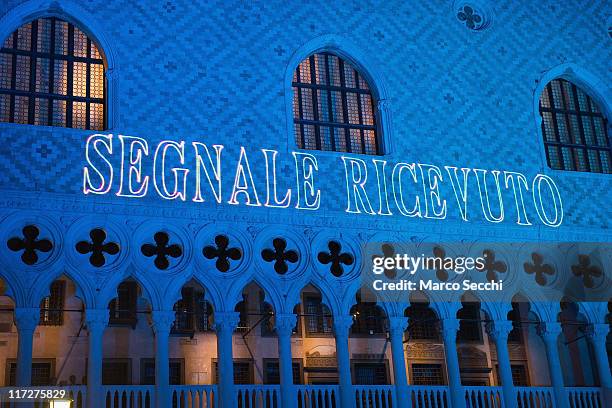 Palazzo Ducale is lit with the words "Segnale Ricevuto" during 'Waves upon Waves' experiment on June 24, 2011 in Venice, Italy. Waves upon Waves was...