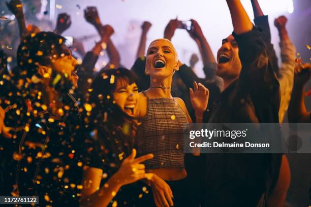 get wild and live a little - nightclub crowd stock pictures, royalty-free photos & images