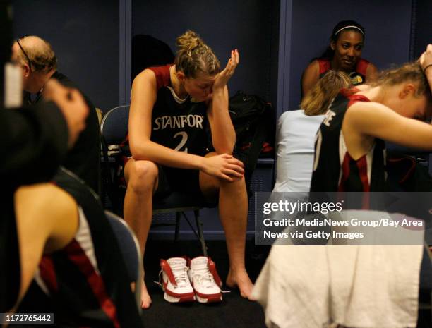 Stanford Cardinal's Jayne Appel and Candice Wiggins sit in the locker room following their 64-48 loss to the University of Tennessee Lady Volunteers...