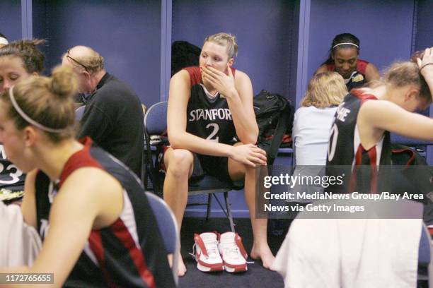 Stanford Cardinal's Jayne Appel and Candice Wiggins sit in the locker room following their 64-48 loss to the University of Tennessee Lady Volunteers...