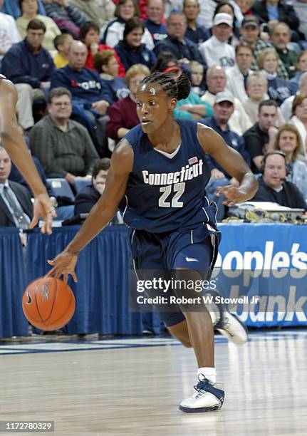 University of Connecticut basketball player Ashley Battle with the ball during a game at the Hartford Civic Center, Hartford, Connecticut, April 19,...