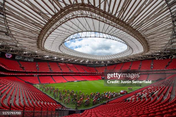 Start / Nairo Quintana of Colombia and Movistar Team Green Points Jersey / Primoz Roglic of Slovenia and Team Jumbo-Visma Red Leader Jersey / Miguel...