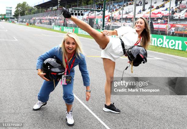 British snowboarder Aimee Fuller and British taekwondo star Jade Jones pose for a photo before the Pirelli Hotlaps during practice for the F1 Grand...