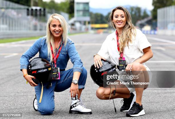 British snowboarder Aimee Fuller and British taekwondo star Jade Jones pose for a photo before the Pirelli Hotlaps during practice for the F1 Grand...