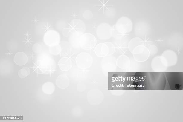 white defocused lights - circle snowflake pattern stock pictures, royalty-free photos & images