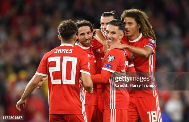 The Wales side celebrate their sides first goal, an own goal scored by Pavlo Pashayev of Azerbaijan during the UEFA Euro 2020 qualifier between Wales...