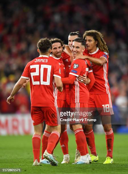 The Wales side celebrate their sides first goal, an own goal scored by Pavlo Pashayev of Azerbaijan during the UEFA Euro 2020 qualifier between Wales...