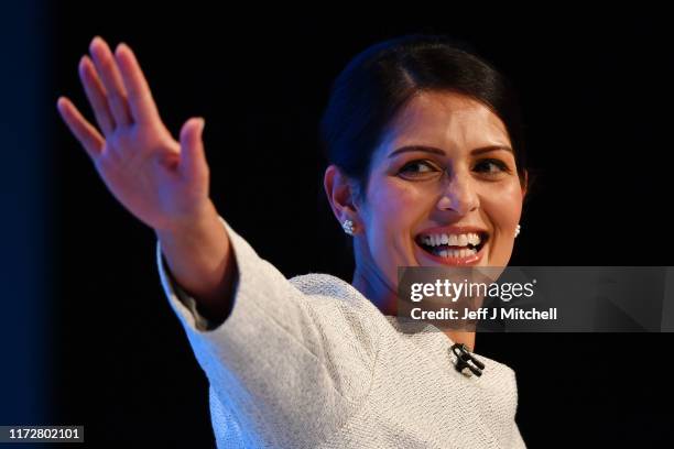 Home Secretary, Priti Patel addresses the delegates on the third day of the Conservative Party Conference at Manchester Central on October 1, 2019 in...