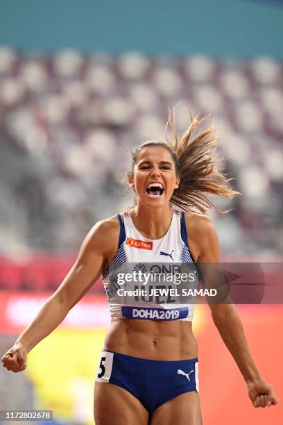 Norway's Amalie Iuel reacts after winning the Women's 400m hurdles race heats at the 2019 IAAF Athletics World Championships at the Khalifa...