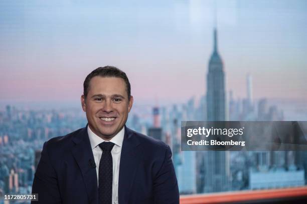 Rob Lynch, chief executive officer of Papa John's International Inc., smiles during a Bloomberg Television interview in New York, U.S., on Tuesday,...