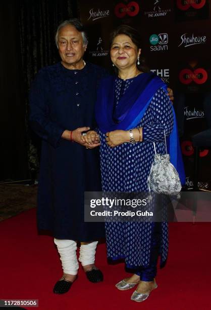 Indian classical sarod player Amjad Ali Khan and his wife Subhalakshmi Barua Khan attends Amaan ali bangash and Ayaan ali Bangash and Karsh Kale's...