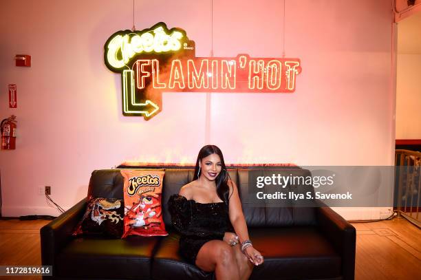 Ashanti attends as Cheetos unveiled fan-inspired versions of the #CheetosFlaminHaute look at The House Of Flamin' Haute Runway Show + Style Bar...