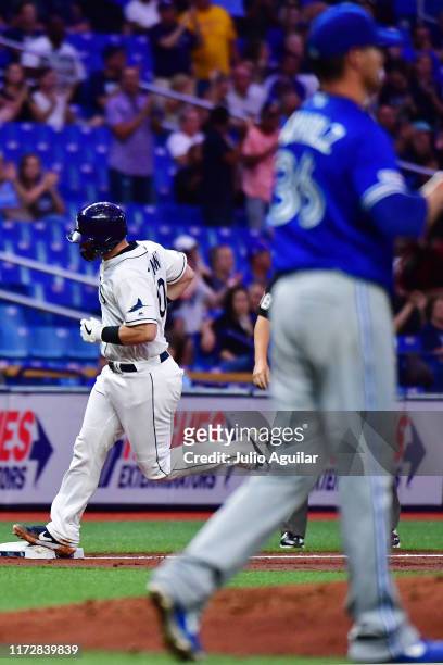 Mike Zunino of the Tampa Bay Rays runs the bases after hitting a two-run homer off Clay Buchholz of the Toronto Blue Jays in the second inning of a...