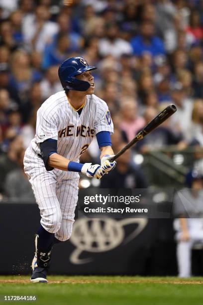 Christian Yelich of the Milwaukee Brewers hits a three run home run against the Chicago Cubs during the third inning at Miller Park on September 06,...