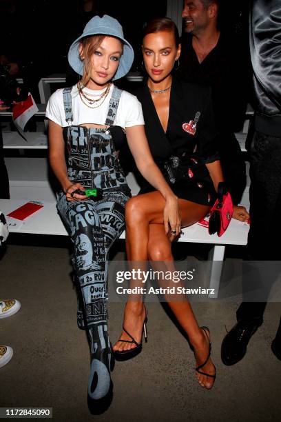 Gigi Hadid and Irina Shayk attends the Jeremy Scott front row during New York Fashion Week: The Shows at Gallery I at Spring Studios on September 06,...