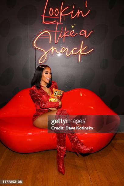 Saweetie attends as Cheetos unveiled fan-inspired versions of the #CheetosFlaminHaute look at The House Of Flamin' Haute Runway Show + Style Bar...