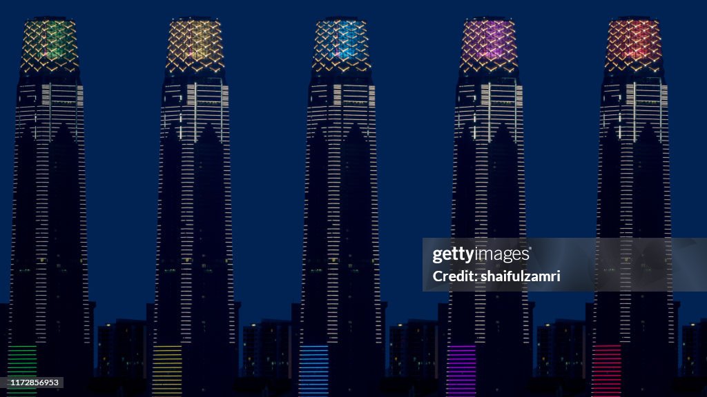 Composite of 5 images of The Exchange 106, the 106-floor building is topped with 12 storey high illuminated crown making it 452m tall.