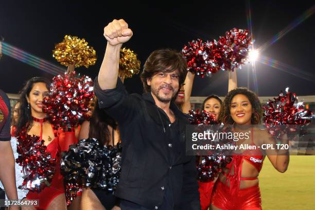 In this handout image provided by CPL T20, Shah Rukh Khan owner of Trinbago Knight Riders greets the crowd during the Hero Caribbean Premier League...