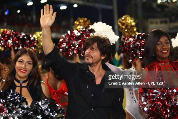 In this handout image provided by CPL T20, Shah Rukh Khan owner of Trinbago Knight Riders greets the crowd during the Hero Caribbean Premier League...