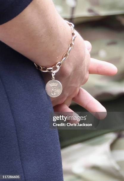 Catherine, Duchess of Cambridge presents medals to members of the Irish Guards at the Victoria Barracks on June 25, 2011 in Windsor, England. The...