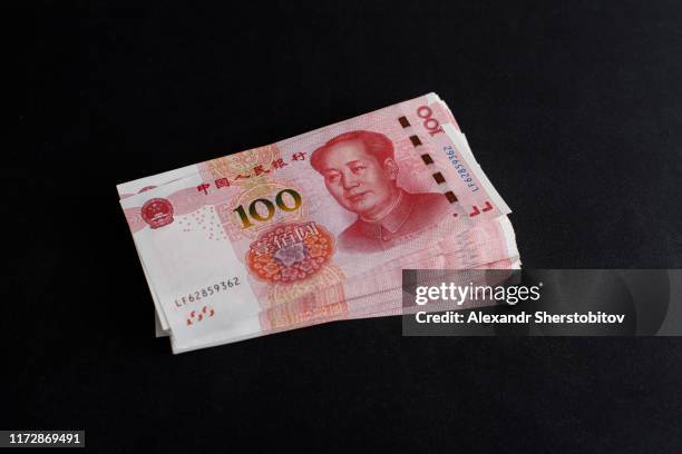 chinese money. renminbi - images of chinese yuan banknotes stock pictures, royalty-free photos & images