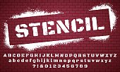 Stencil font. Graffiti spray painted alphabet, dirty textured lettering and grunge letters vector set