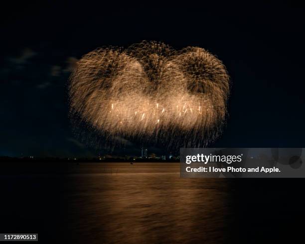 fireworks festival - exploding apple stock pictures, royalty-free photos & images
