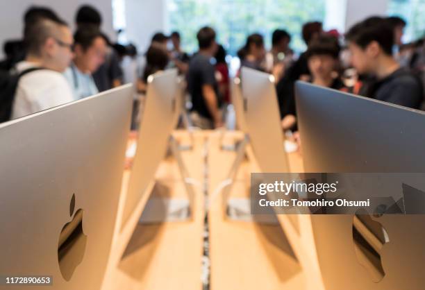 Customers try iMac desktop computers in the Apple Marunouchi store on September 07, 2019 in Tokyo, Japan. Apple inc. Opened its largest store in...