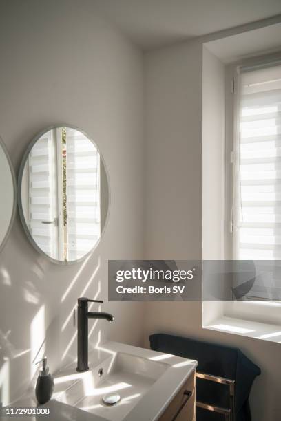 bathroom lit by the morning light - paris france hotel stock pictures, royalty-free photos & images