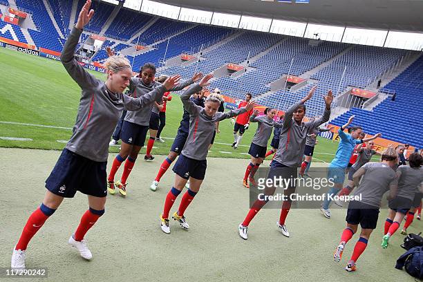 The team of France warms up during the France Women national team traaining session at Rhein-Neckar Arena on June 25, 2011 in Sinsheim, Germany.