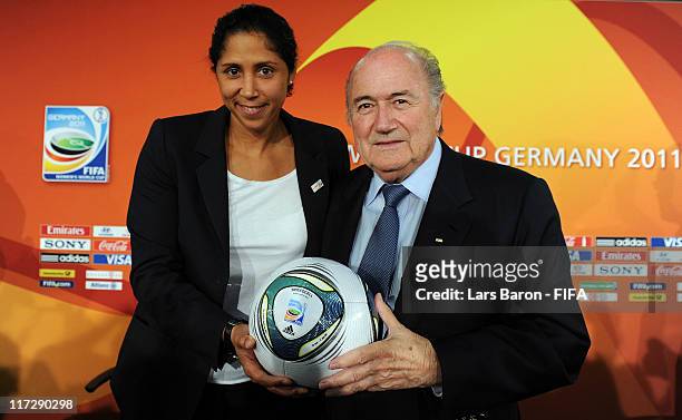 Steffi Jones, LOC president, and Joseph S. Blatter, FIFA president, pose during the FIFA Women's World Cup 2011 opening press conference at Olympia...