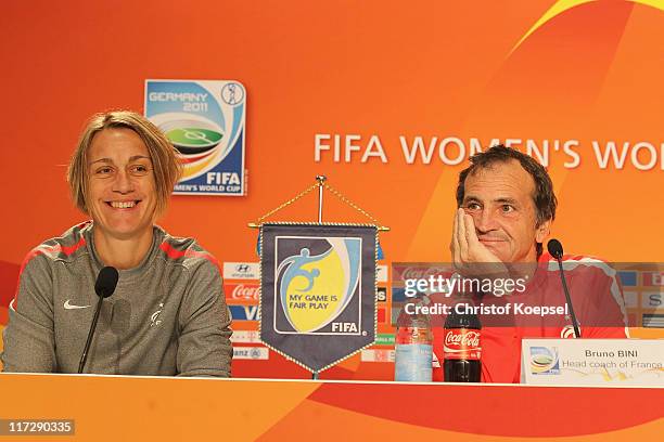 Sandrine Soubeyrand and national coach Bruno Bini of France attends the France Women national team press conference at Rhein-Neckar Arena on June 25,...