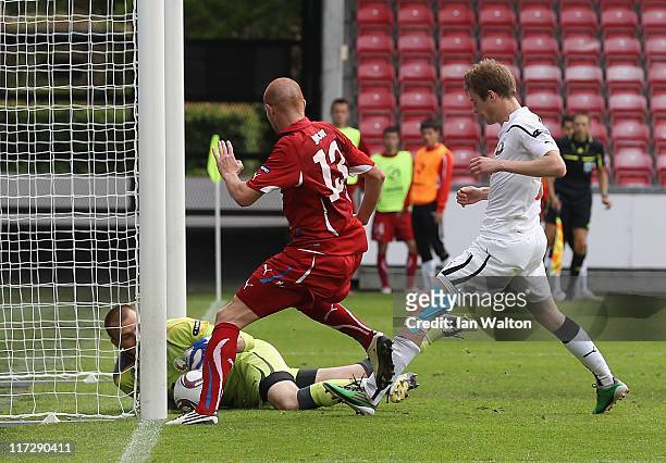 Aleksandr Gutor of Belarus makes a save during the UEFA European U21 Championship third place playoff match between Czech Republic and Belarus at the...