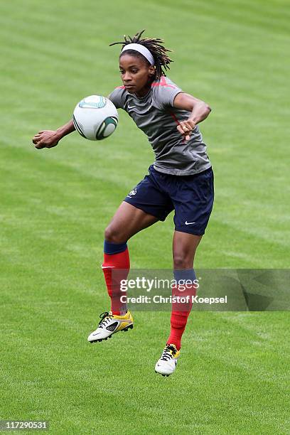 Elodie Thomis stops the ball during the France Women national team traaining session at Rhein-Neckar Arena on June 25, 2011 in Sinsheim, Germany.