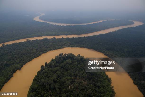 Kahayan River is pictured as smog covers the area due to the forest fire in Palangka Raya, Central Kalimantan province, Indonesia, October 1, 2019....