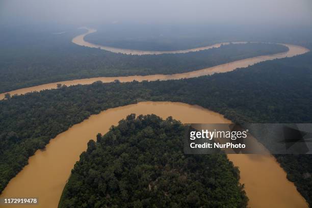 Kahayan River is pictured as smog covers the area due to the forest fire in Palangka Raya, Central Kalimantan province, Indonesia, October 1, 2019....