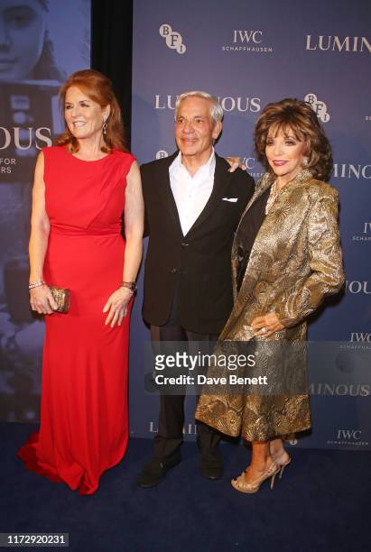 Sarah Ferguson, Duchess of York, Simon Reuben and Dame Joan Collins attend the BFI & IWC Luminous Gala at The Roundhouse on October 1, 2019 in...