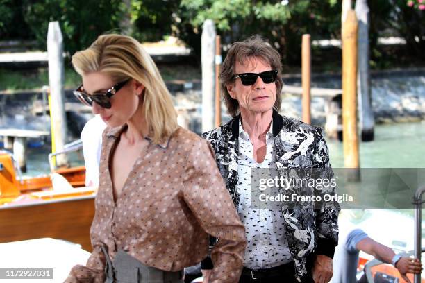 Australian actress Elizabeth Debicki, British musician, singer and actor Mick Jagger are seen arriving at the 76th Venice Film Festival on September...