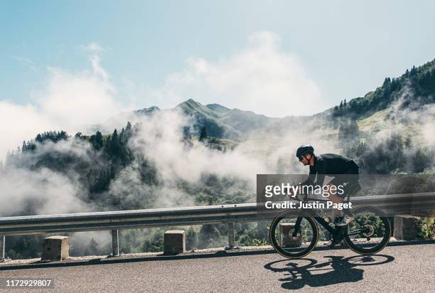 cyclist on col de la colombière - shorts down stock pictures, royalty-free photos & images