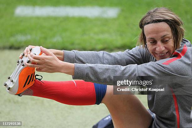 Sandrine Soubeyrand stretches during the France Women national team traaining session at Rhein-Neckar Arena on June 25, 2011 in Sinsheim, Germany.