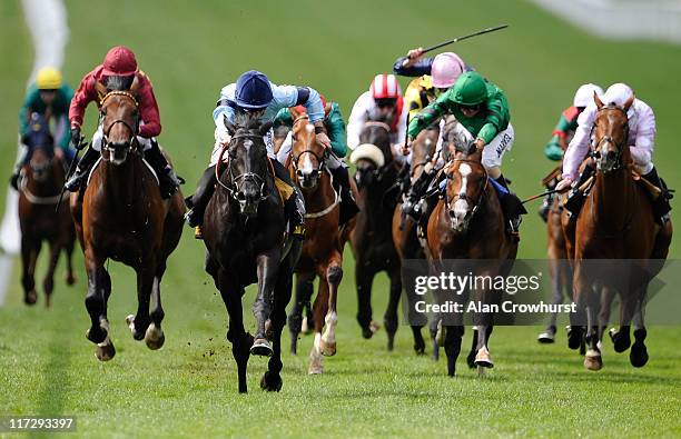 Neill Callan riding Dominant win The £150,000 Tattersalls Millions 3-Y-O Cup at Newmarket racecourse on June 25, 2011 in Newmarket, England.