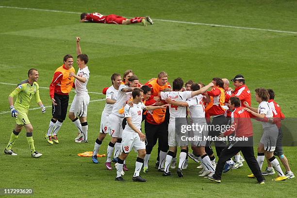 Belarus celebrate their 1-0 victory at the final whistle during the UEFA European Under-21 Championship 3rd/4th Play Off match between Belarus and...