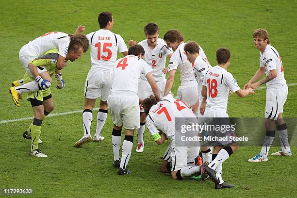 Belarus players celebrate the winning goal scored by Yegor Filipenko during the UEFA European Under-21 Championship 3rd/4th Play Off match between...