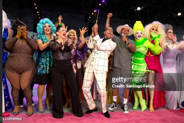 RuPaul cuts the ribbon as Michelle Visage, Jamal Sims, Mrs. Kasha Davis, Art SImone, Yvie Oddly, Brooklyn Hytes and Nina West look on during RuPaul's...
