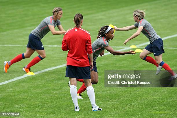 Elodie Thomis of France runs during the France Women national team training session at Rhein-Neckar Arena on June 25, 2011 in Sinsheim, Germany.