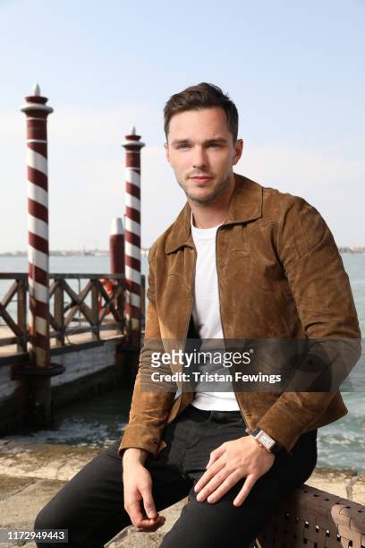 Nicholas Hoult poses for a portrait wearing a Jaeger-LeCoultre watch during the 76th Venice Film Festival at a dock outside of the San Clemente...