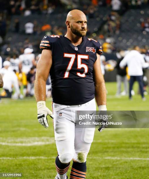 Kyle Long of the Chicago Bears walks off the field at the end of his team's 10-3 loss to the Green Bay Packers at Soldier Field on September 05, 2019...