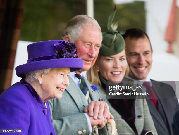 Queen Elizabeth II, Prince Charles, Prince of Wales, Autumn Phillips and Peter Phillips attend the 2019 Braemar Highland Games on September 07, 2019...