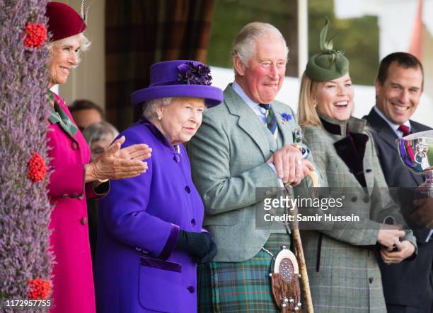 Camilla, Duchess of Cornwall, Queen Elizabeth II, Prince Charles, Prince of Wales, Autumn Phillips and Peter Phillips attend the 2019 Braemar...
